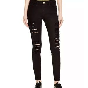 Frame Le Skinny de Jeanne black jeans with distressed/ripped detail